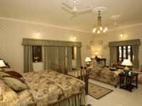 Deluxe room with sofa and chandelier