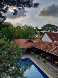 Tiled roofs and courtyard pool from above