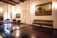 Hall with hanging swing and wooden bench