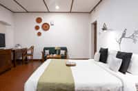 Bawa room with terracotta floor and desk
