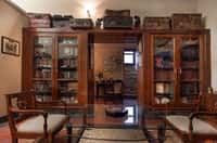 Library with glazed wooden bookcases
