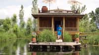 Carved wooden pavilion end seen from the water
