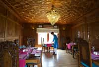 Dining room panelled in carved walnut