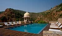 Hilltop pool with domed chhatri and hills