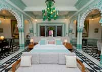 Imperial Suite with green glass chandelier and arches