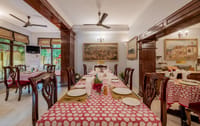 Dining room with block-printed table linen, Dera Rawatsar, Jaipur