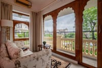 Arched balcony sitting area overlooking the garden, Dera Rawatsar, Jaipur