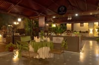 The Garden Cafe set for dinner under a canopy in the evening, Fort Dhariyawad, Dhariyawad
