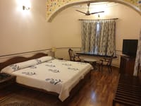 Twin-bedded room with wooden floor, Jas Vilas, Jaipur