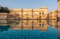 Outdoor swimming pool with palace views, Kesar Bagh Palace, Chittorgarh