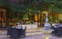 Courtyard dining by the lotus fountain at Panchranga restaurant, Ranbanka Palace, Jodhpur