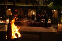 Langa folk musicians performing by firelight in the courtyard, Ranbanka Palace, Jodhpur