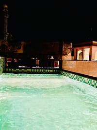 Green-tiled plunge pool, Surya Haveli, Jaipur