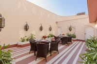 Tables set at the Amer Sky rooftop restaurant, Surya Haveli, Jaipur