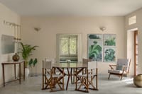 Lounge with artworks and garden view