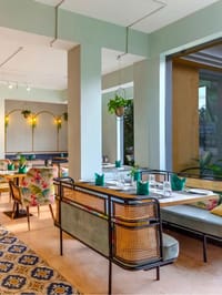 Casita restaurant interior with cane banquettes