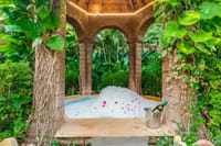 The garden jacuzzi under its laterite gazebo at Casa de Goa
