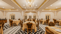 Kesar restaurant interior with chandelier and chequered floor
