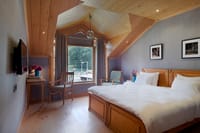Attic room with cedar bed at Nadis