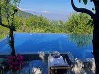 Infinity pool over Dal Lake at Qayaam Gah