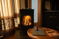 Bukhari wood stove in a room at Qayaam Gah