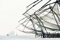 Chinese fishing nets on the Fort Cochin shore, a three-minute walk from The Malabar House