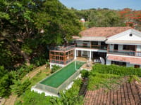 Aerial view of the estate and stone infinity pool