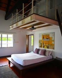 Heritage room with split-level mezzanine above the bed