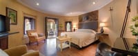 Suite bedroom with sitting area