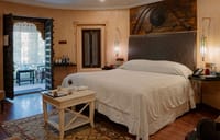 Vintage Suite bedroom with antique lanterns