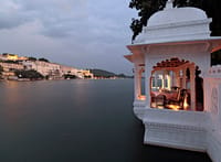 Candlelit marble pavilion standing over the lake