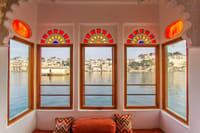 Bay window with stained glass fanlights over the lake