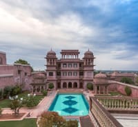 Painted fort facade above the pool