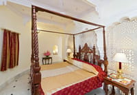 Royal Suite with carved four-poster bed