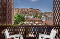 Private terrace behind a pierced stone screen