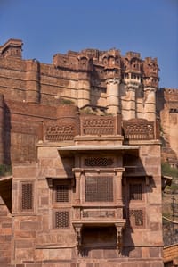 Carved sandstone jharokha on the facade