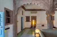 Arched heritage suite with green stone floor