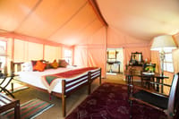 Tent bedroom with campaign furniture
