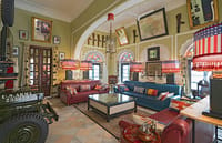 Lounge built around a half cut US Army jeep, war memorabilia and maps on the walls