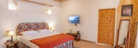 Shooting Star room, upholstered bed head, pine door and standing mirror
