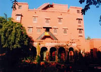 Haveli facade lit at dusk