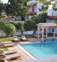 Poolside loungers and garden