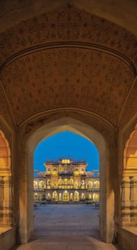 Painted gateway arch framing the palace