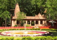 Temple and circular flowerbed in the grounds