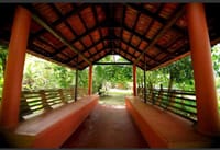 Covered walkway leading out into the garden