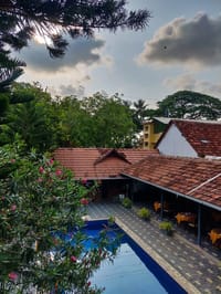 Tiled roofs and courtyard pool from above