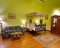 Royal Room with four-poster bed and sofa
