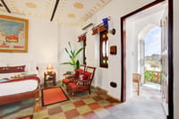 Riverside room with painted ceiling and chequered floor