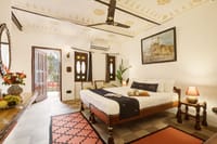 Poolside deluxe room with door open to a terrace