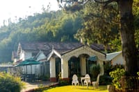 Mansion with arched verandah and lawn